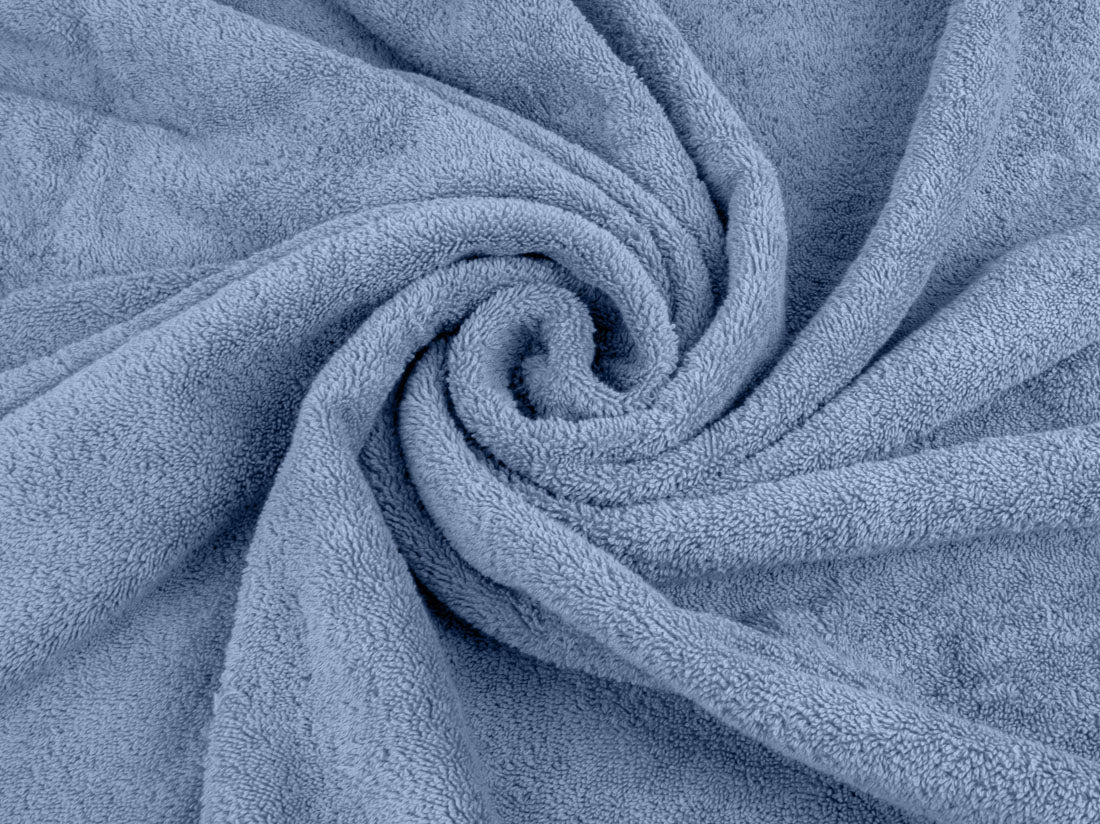 Organic cotton luxury bath towel close up in blue